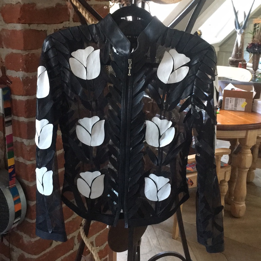 Appliqué lamb skin Leather and mesh jacket.